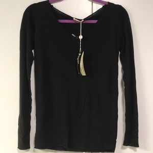 Black sweater with beautiful back detail.